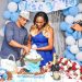 Aly and Sylvia cut the cake at her baby shower.