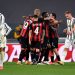 TURIN, ITALY - MAY 09: Ante Rebic of A.C. Milan (hidden) celebrates with team mates after scoring their side's second goal during the Serie A match between Juventus  and AC Milan at  on May 09, 2021 in Turin, Italy. Sporting stadiums around Italy remain under strict restrictions due to the Coronavirus Pandemic as Government social distancing laws prohibit fans inside venues resulting in games being played behind closed doors. (Photo by Valerio Pennicino/Getty Images)