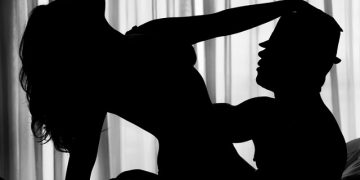 Sexy silhouette of a couple in bed. You might also be interested in these: