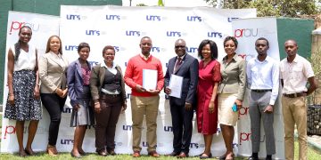 UMS board members and the PRAU Governing Council pose for a group photo after the MOU signing.
